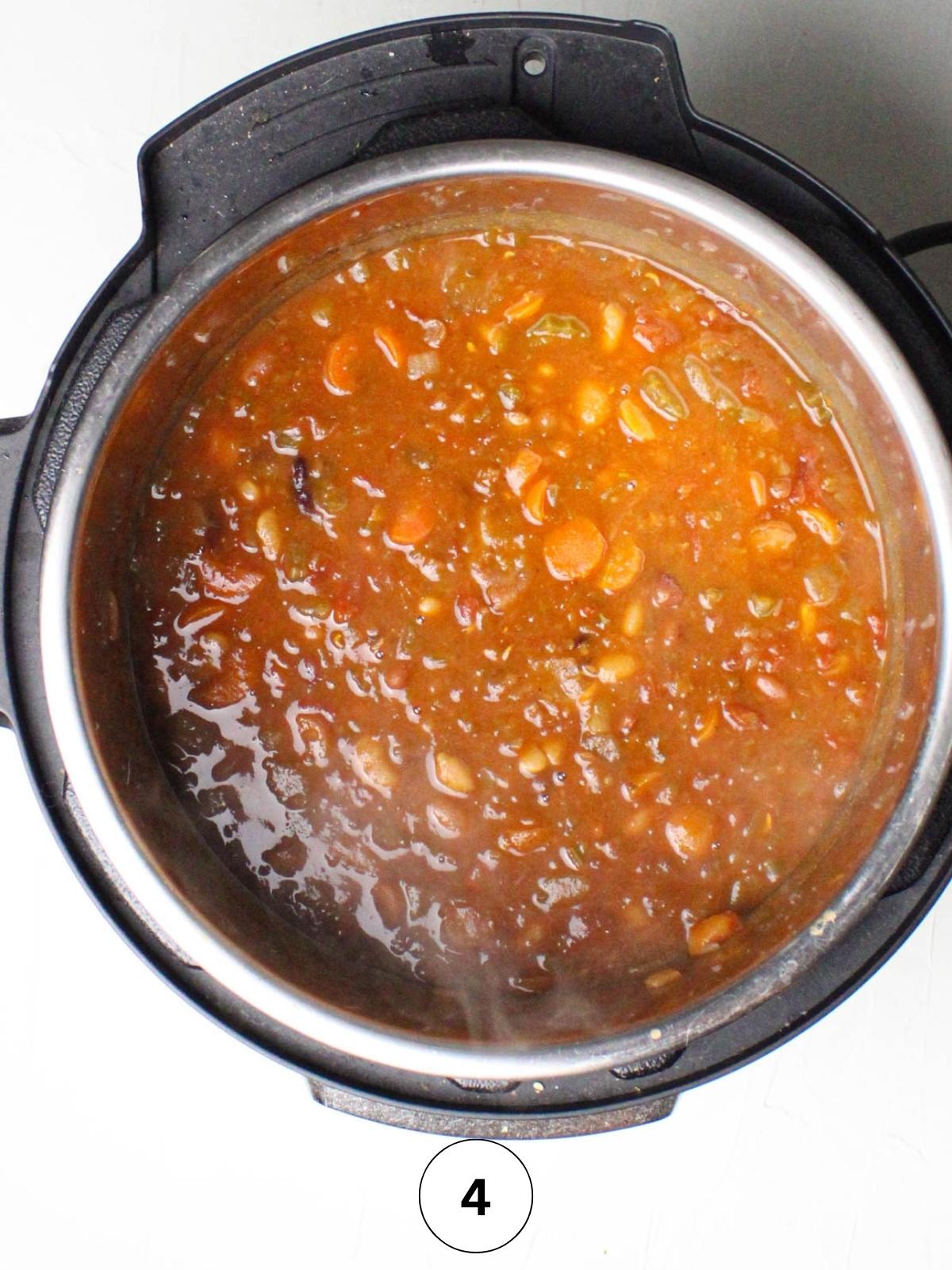 Instant Pot with cooked soup in it.